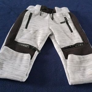 Boys sweatpants with zippers  pockets and with draw string